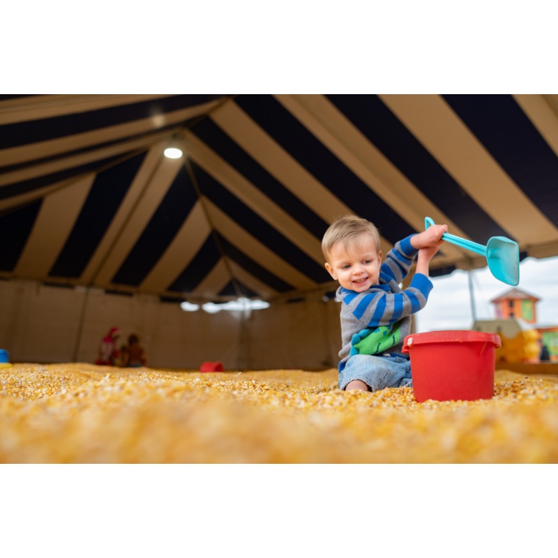 Corn Cob Beach_Boy playing pail shovel 2_RJ.jpg