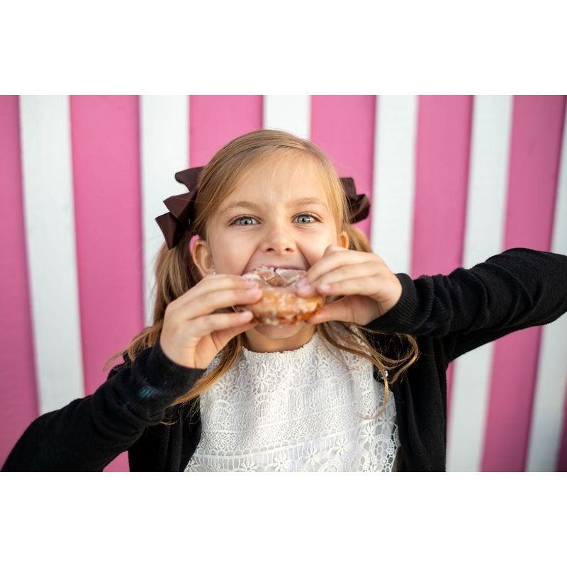 Donuts_Girl_Eating big bite 2_RJ.jpg