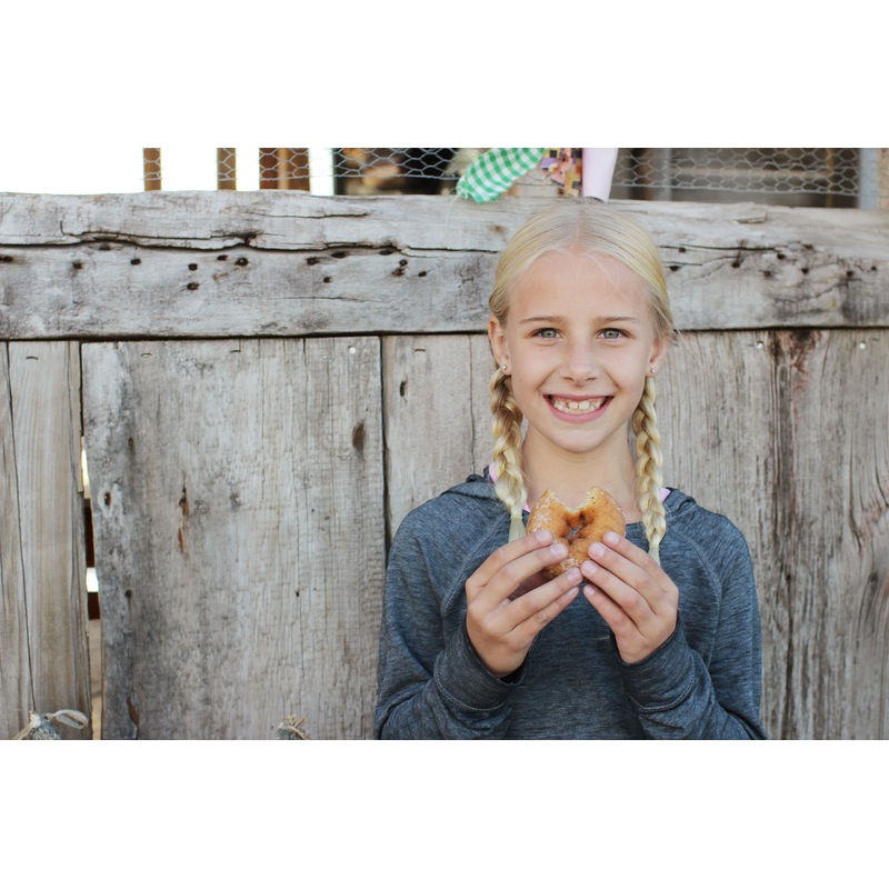 Donuts_Girl_Smile bite.jpg