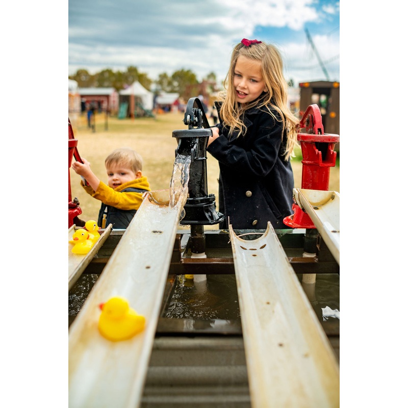 Duck Races_Girl_Pumping water_RJ.jpg