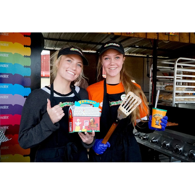 Employee_Grill Shack_Smiling with kids meal.jpeg