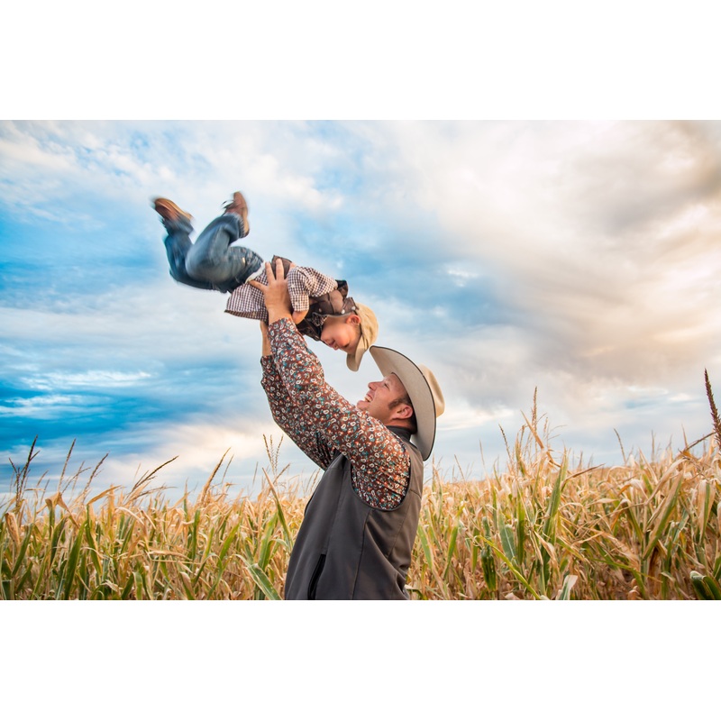 Maze_Norton_Dad Son_swing high laughing.jpg