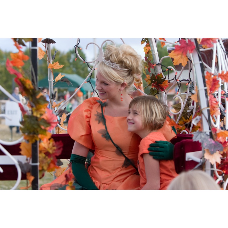 Pumpkin Princess_Carriage_guest smiling.jpg