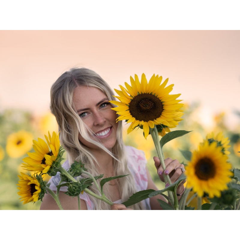 Sunflower_Woman_Peeking Behind.jpg