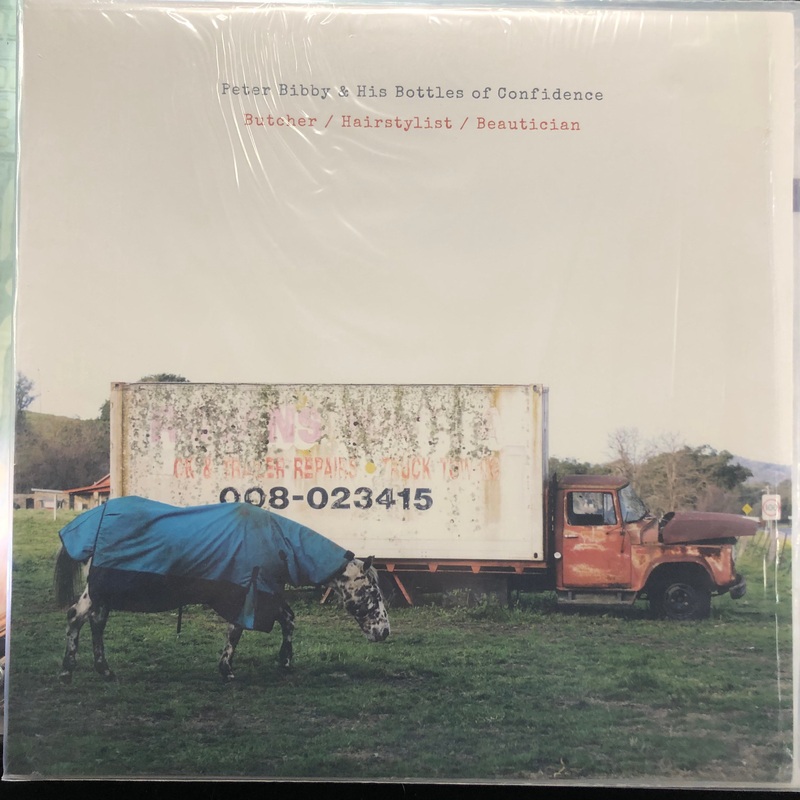 Peter Bibby & His Bottles Of Confidence – Butcher / Hairstylist / Beautician